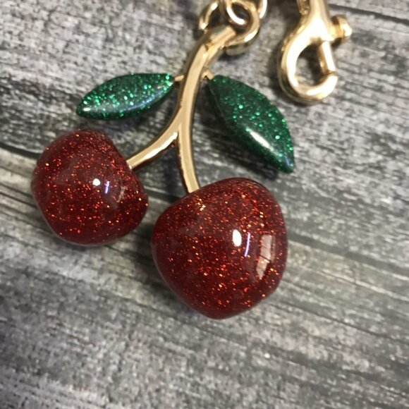 Coach Glitter Cherry Keychain with Gold and Green Accents - Picture 4 of 6